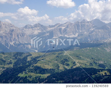 paragliding in dolomites mountains paragliding in dolomites mountains 139240569