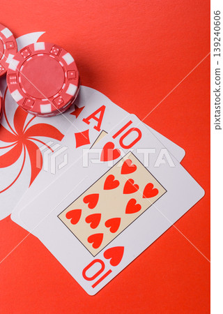 Playing cards and chips on a table, a gambling game of blackjack or baccarat. Cards and chips 139240606
