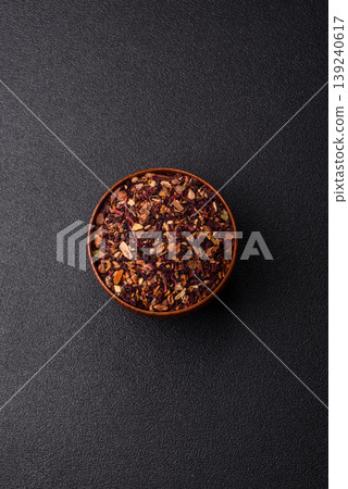 Dry herbal or fruit tea with flower petals and aromatic additives. Dry fruit herbal tea Dry herbal or fruit tea with flower petals and aromatic additives. Dry fruit herbal tea 139240617