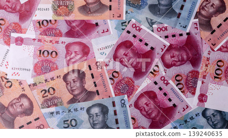 Chinese paper money, yuans in various denominations. China money Chinese paper money, yuans in various denominations. China money 139240635