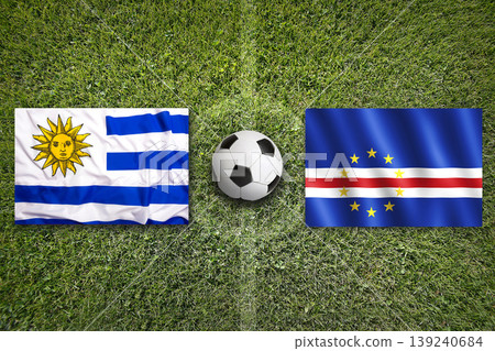 Uruguay vs. Cape Verde flags on a soccer field Uruguay vs. Cape Verde flags on a soccer field 139240684