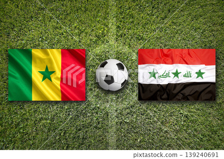 Senegal vs. Iraq flags on a soccer field Senegal vs. Iraq flags on a soccer field 139240691