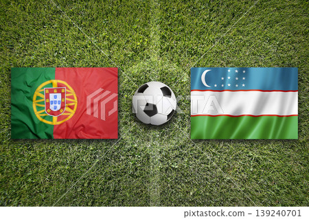 Portugal vs. Uzbekistan flags on a soccer field Portugal vs. Uzbekistan flags on a soccer field 139240701