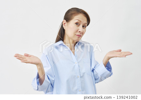 Elderly woman giving up on white background 139241002