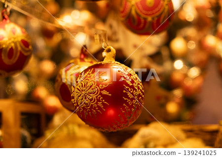 Beautiful Christmas baubles with traditional ornaments, cozy and warm Christmas card 139241025