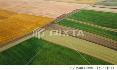 High up aerial view of beautiful agricultural field at daytime 139241053