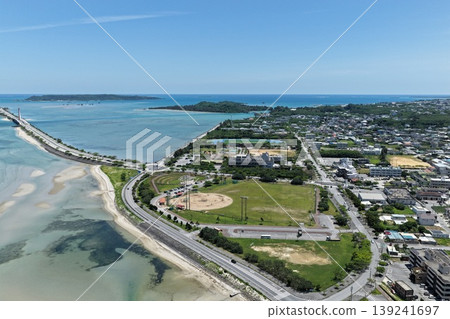 Drone footage (April) showing the emerald green sea and bridge overlooking the Kaichu Road in Okinawa Prefecture. Drone footage (April) showing the emerald green sea and bridge overlooking the Kaichu Road in Okinawa Prefecture. 139241697