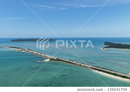 Drone footage (April) showing the emerald green sea and bridge overlooking the Kaichu Road in Okinawa Prefecture. Drone footage (April) showing the emerald green sea and bridge overlooking the Kaichu Road in Okinawa Prefecture. 139241709