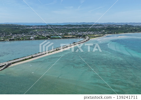 Drone footage (April) showing the emerald green sea and bridge overlooking the Kaichu Road in Okinawa Prefecture. Drone footage (April) showing the emerald green sea and bridge overlooking the Kaichu Road in Okinawa Prefecture. 139241711