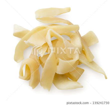 Pile of dried squid pieces close-up on a white background. Top view 139241730