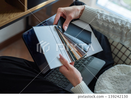 Person choosing material samples for interior design project Person choosing material samples for interior design project 139242130