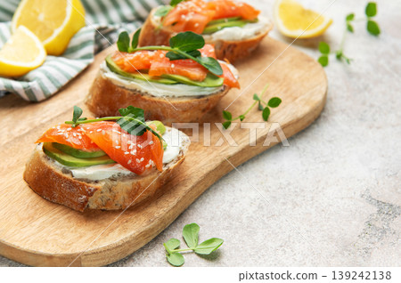 Smoked salmon toast with avocado and cream cheese Smoked salmon toast with avocado and cream cheese 139242138