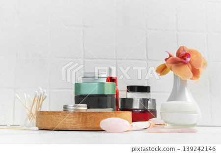 Skincare products, facial roller, gua sha beauty routine 139242146