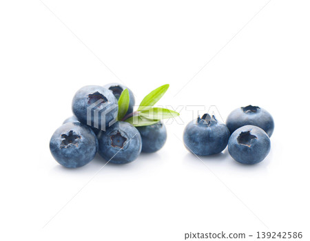 Blueberries with leaves on white backgrounds 139242586
