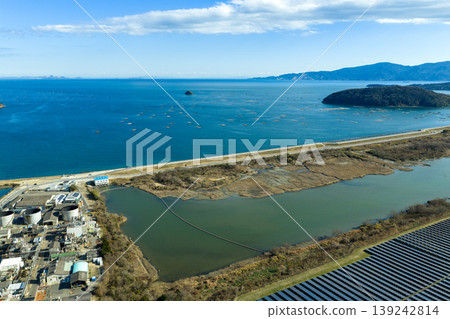 Drone aerial photography of a mega solar power plant along the Seto Inland Sea in Ushimado Town, Okayama Prefecture. Drone aerial photography of a mega solar power plant along the Seto Inland Sea in Ushimado Town, Okayama Prefecture. 139242814