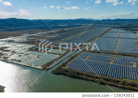 Drone aerial photography of a mega solar power plant along the Seto Inland Sea in Ushimado Town, Okayama Prefecture. Drone aerial photography of a mega solar power plant along the Seto Inland Sea in Ushimado Town, Okayama Prefecture. 139243011