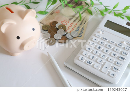 Piggy bank and money (savings, asset building, household budget management) Piggy bank and money (savings, asset building, household budget management) 139243027