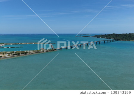 Drone aerial footage of the port scenery and blue sea at Henza South Port in Okinawa Prefecture. Drone aerial footage of the port scenery and blue sea at Henza South Port in Okinawa Prefecture. 139243199