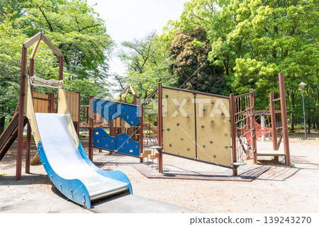 Scenery with playground equipment in the park Scenery with playground equipment in the park 139243270