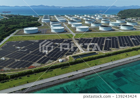 Drone aerial photography of a mega solar power plant along the coast of Henza Island, Okinawa Prefecture. Drone aerial photography of a mega solar power plant along the coast of Henza Island, Okinawa Prefecture. 139243424