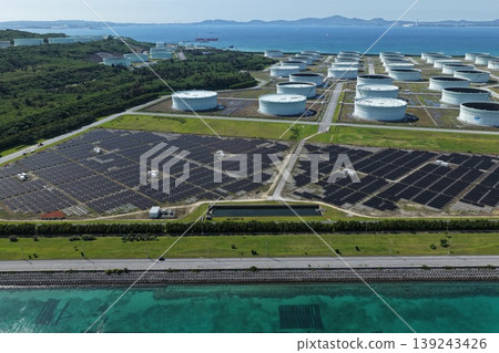 Drone aerial photography of a mega solar power plant along the coast of Henza Island, Okinawa Prefecture. Drone aerial photography of a mega solar power plant along the coast of Henza Island, Okinawa Prefecture. 139243426