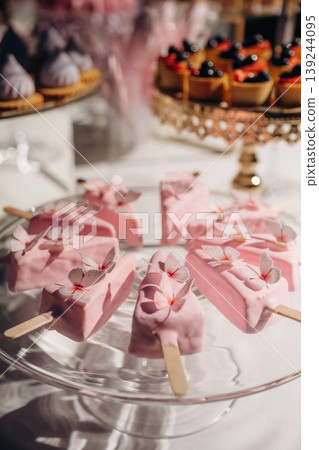 Many of the sweets in shape of ice cream on the table, celebration Many of the sweets in shape of ice cream on the table, celebration 139244095