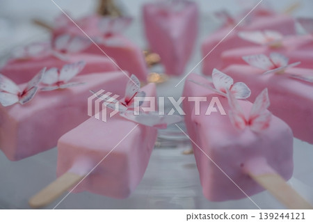 Ice cream shape. Detailed close up view of bunch of delicious sweets, celebration event Ice cream shape. Detailed close up view of bunch of delicious sweets, celebration event 139244121