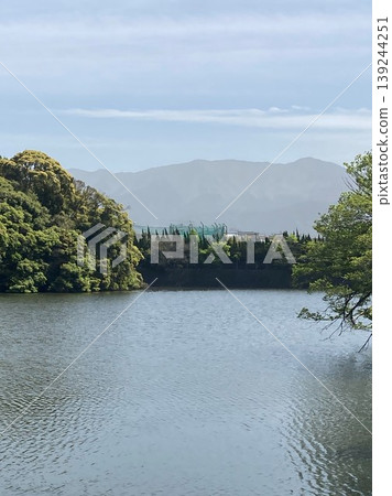 Mountains viewed from the pond Mountains viewed from the pond 139244251