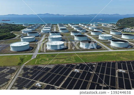 Drone aerial photography of oil tanks and solar power facilities on Henza Island, Okinawa Prefecture. 139244638