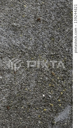Textured Asphalt Surface with Natural Elements 139244821