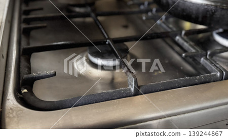 Close-Up of a Modern Gas Stove with Burners and Grates 139244867