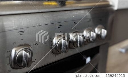 Close-Up of Modern Kitchen Oven Control Knobs Close-Up of Modern Kitchen Oven Control Knobs 139244913