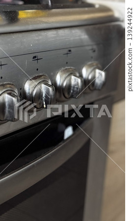 Close-Up of Modern Stainless Steel Gas Stove Controls Close-Up of Modern Stainless Steel Gas Stove Controls 139244922