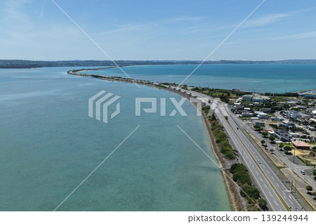 Drone aerial photography of the coastal road and the blue sea along the Kaichu Road in Okinawa Prefecture. Drone aerial photography of the coastal road and the blue sea along the Kaichu Road in Okinawa Prefecture. 139244944