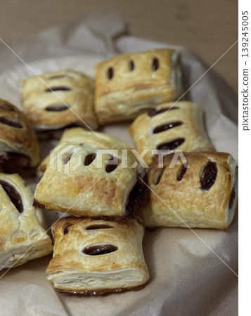 Delicious Freshly Baked Pastries on Rustic Paper Delicious Freshly Baked Pastries on Rustic Paper 139245005