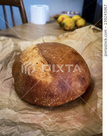 Freshly Baked Artisan Bread on Crumpled Paper Freshly Baked Artisan Bread on Crumpled Paper 139245067