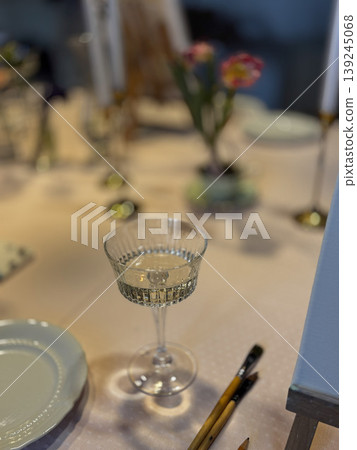 Elegant Table Setting with Glassware and Floral Decor Elegant Table Setting with Glassware and Floral Decor 139245068