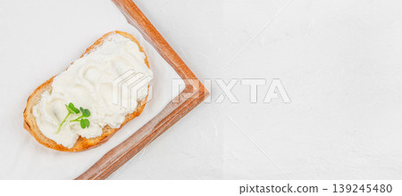 Top view of cream cheese spread on toast minimal breakfast banner with copy space 139245480