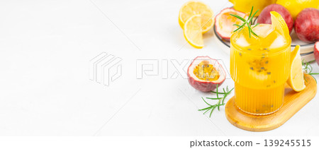 Fresh tropical passion fruit lemonade cocktail with ice and copy space for summer advertising banner 139245515