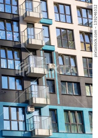 Detailed architectural pattern. Geometric balcony pattern with cooling units and textured surfaces Detailed architectural pattern. Geometric balcony pattern with cooling units and textured surfaces 139246312
