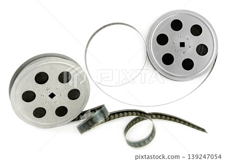 Vintage Metal Film Reels with Unspooled 35mm Movie Strip 139247054
