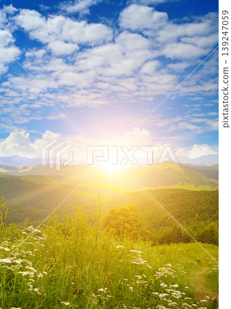 Panoramic Mountain Landscape with Lush Green Valleys at Sunrise Panoramic Mountain Landscape with Lush Green Valleys at Sunrise 139247059