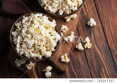 Popcorn Bowles on Dark Wooden Table Popcorn Bowles on Dark Wooden Table 139247187