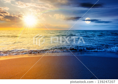 vacation at the sea on autumn equinox. day meet night. sun and moon over beautiful seascape. waves wash the sandy beach. image with epic sky above horizon. background for relaxation or ads placement vacation at the sea on autumn equinox. day meet night. sun and moon over beautiful seascape. waves wash the sandy beach. image with epic sky above horizon. background for relaxation or ads placement 139247207