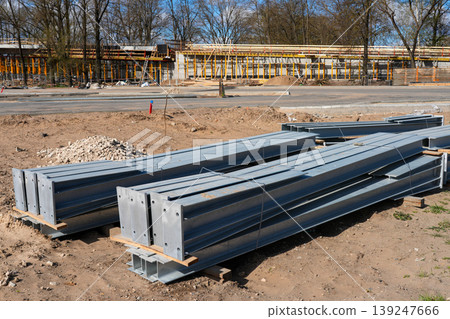 Steel I-beams stacked at construction site for bridge and infrastructure development project work 139247666