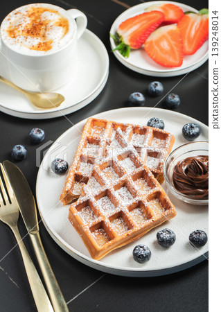 Belgium waffles Homemade waffles with strawberries 139248014