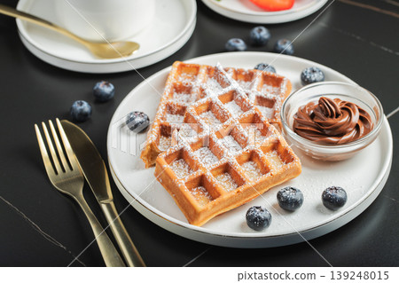 Belgium waffles Homemade waffles with strawberries 139248015