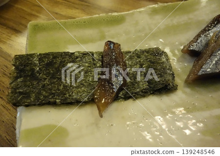 Sushi with Seaweed and Pickled Fish on Plate Sushi with Seaweed and Pickled Fish on Plate 139248546