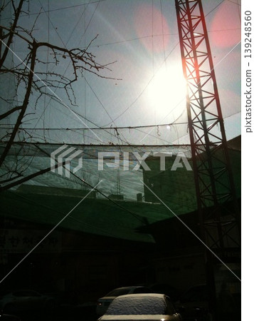 Urban Construction Scene with Crane and Sunlight Urban Construction Scene with Crane and Sunlight 139248560