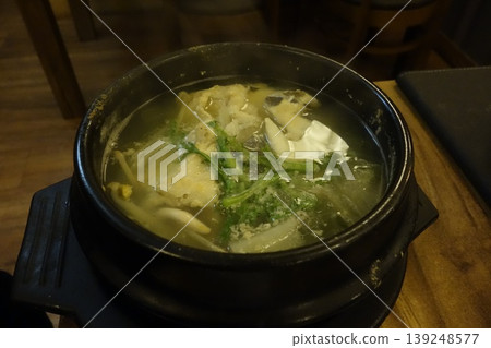 Steaming Korean Hot Pot with Seafood and Vegetables Steaming Korean Hot Pot with Seafood and Vegetables 139248577